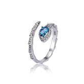 Glojewels Unique Curved Halo Blue Natural Topaz Pear Cut Silver Band Ring