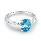 Glojewels Classical Half Eternity Blue Topaz Oval Cut Silver Ring