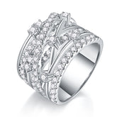 Glojewels Love's Embrace Crossover White Moissanite Round Cut Silver Band Ring