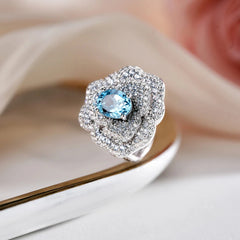 Glojewels Romantic Blossom Cluster Aqua Blue Natural Topaz Oval Cut Silver Ring
