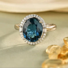 Glojewels Timeless Elegant Halo Blue Natural Topaz Oval Cut Silver Ring