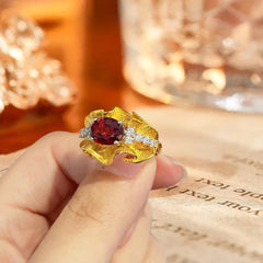 Glojewels Two Tone Bold Artistic Red Natural Garnet Oval Cut Silver Ring