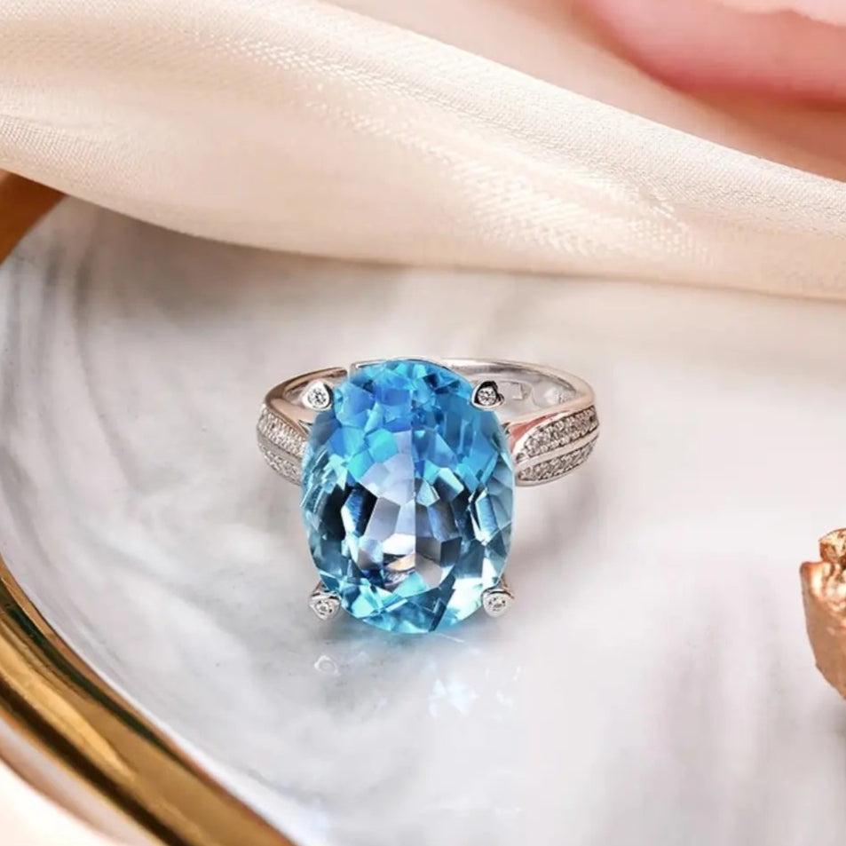 Glojewels Chic Accent Skyl Blue Natura Topaz Oval Cut Silver Ring