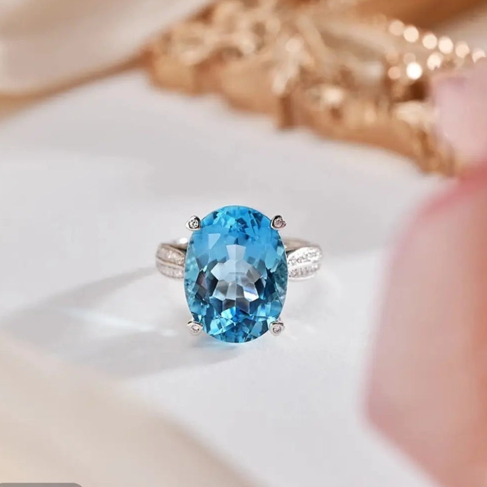 Glojewels Chic Accent Skyl Blue Natura Topaz Oval Cut Silver Ring
