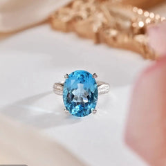 Glojewels Chic Accent Skyl Blue Natura Topaz Oval Cut Silver Ring
