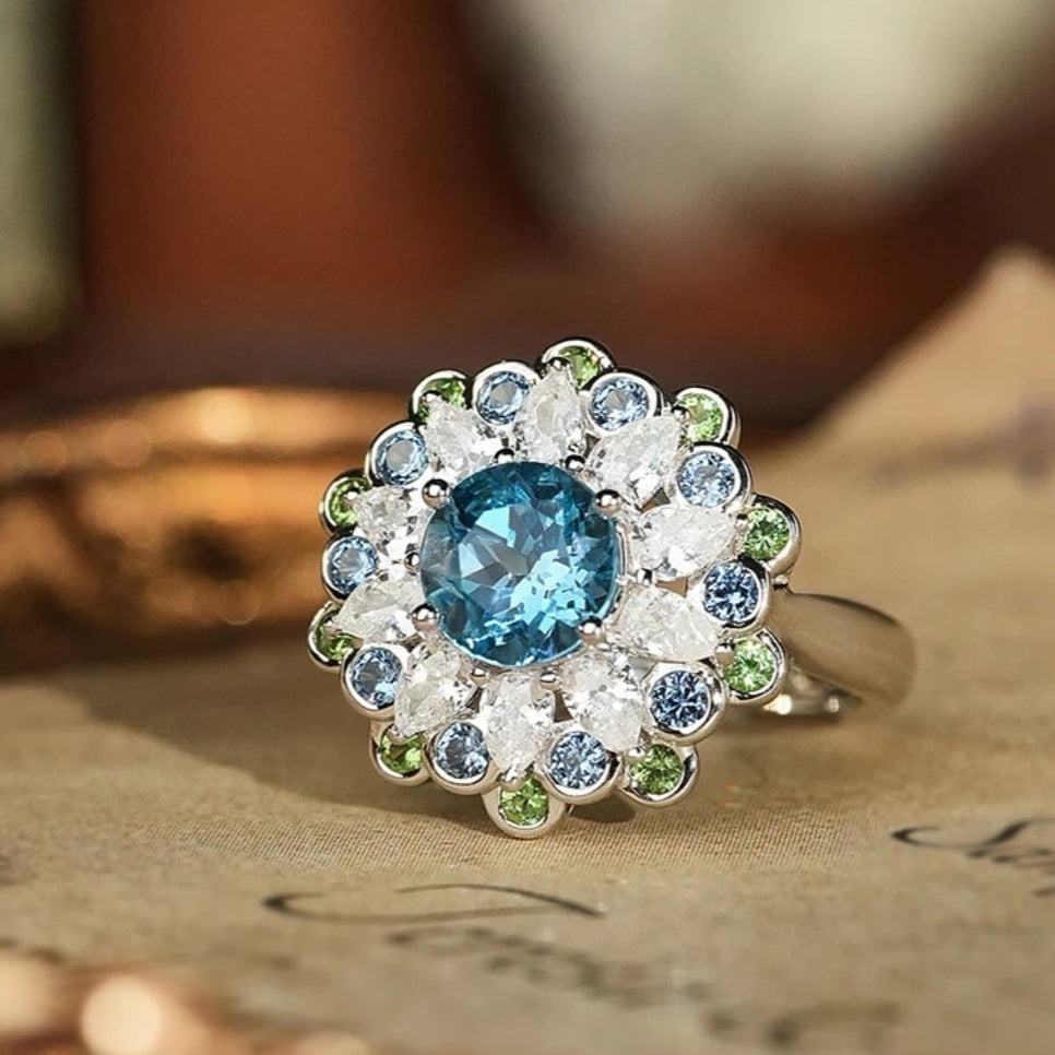 Glojewels Halo Flower Design Aqua Blue  Natural Topaz Round Cut Silver Ring