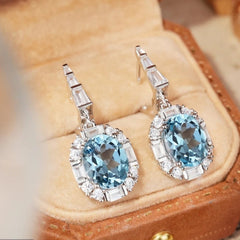 Glojewels Vintage-Inspired Halo Blue Natural Topaz Oval Cut Silver Drop Earring