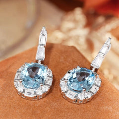 Glojewels Vintage-Inspired Halo Blue Natural Topaz Oval Cut Silver Drop Earring