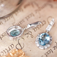 Glojewels Vintage-Inspired Halo Blue Natural Topaz Oval Cut Silver Drop Earring