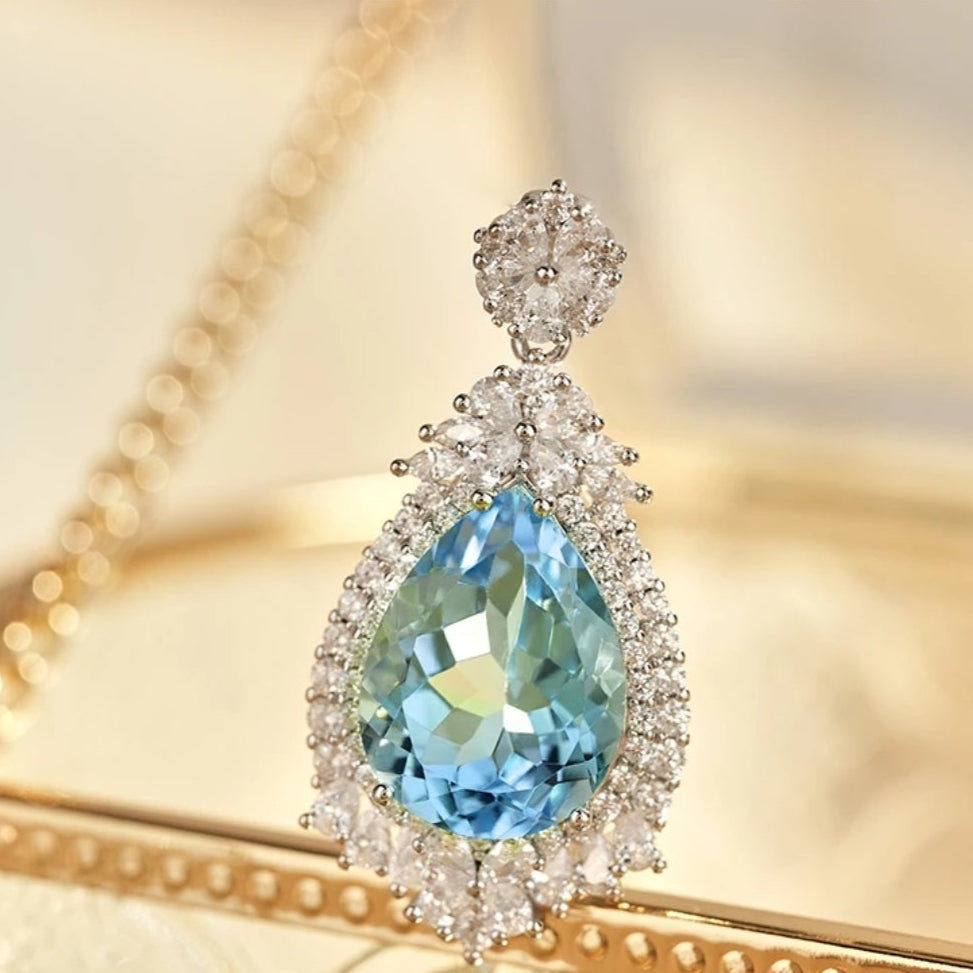 Glojewels Floral Accents Halo Blue Natural Topaz Pear Cut Silver Pendant Necklace