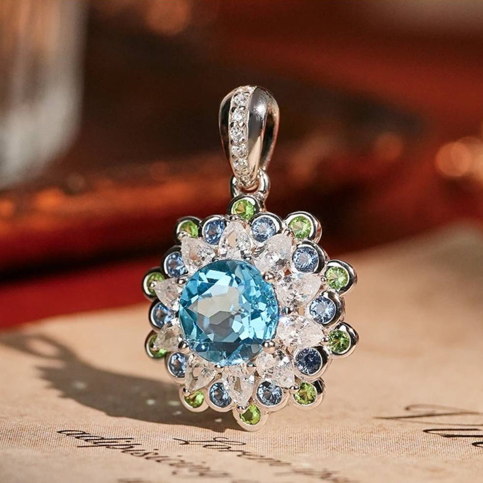 Glojewels Floral-Inspired Halo Blue Natural Topaz Round Cut Silver Pendant Necklace