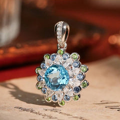 Glojewels Floral-Inspired Halo Blue Natural Topaz Round Cut Silver Pendant Necklace