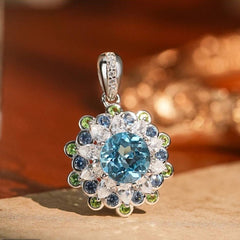 Glojewels Floral-Inspired Halo Blue Natural Topaz Round Cut Silver Pendant Necklace