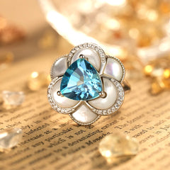 Glojewels Halo Flower Design Blue Natural Topaz Triangle Cut Silver Ring