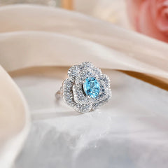 Glojewels Romantic Blossom Cluster Aqua Blue Natural Topaz Oval Cut Silver Ring