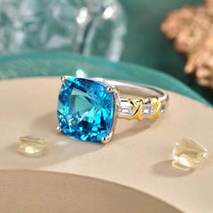 Glojewels Two Tone X-cross Band Blue Natural Topaz Cushion Cut Silver Ring