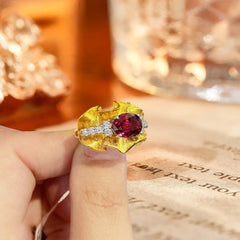 Glojewels Two Tone Bold Artistic Red Natural Garnet Oval Cut Silver Ring
