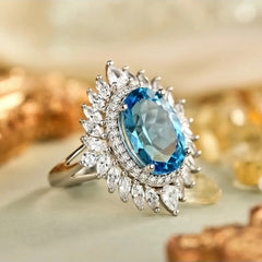 Glojewels Flower Double Halo Blue Natural Topaz Oval Cut Silver Ring