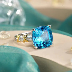 Glojewels Two Tone X-cross Band Blue Natural Topaz Cushion Cut Silver Ring
