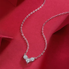 Glojewels Heart Shape White 1.2ctw Round Cut Moissanite Pendant Necklace