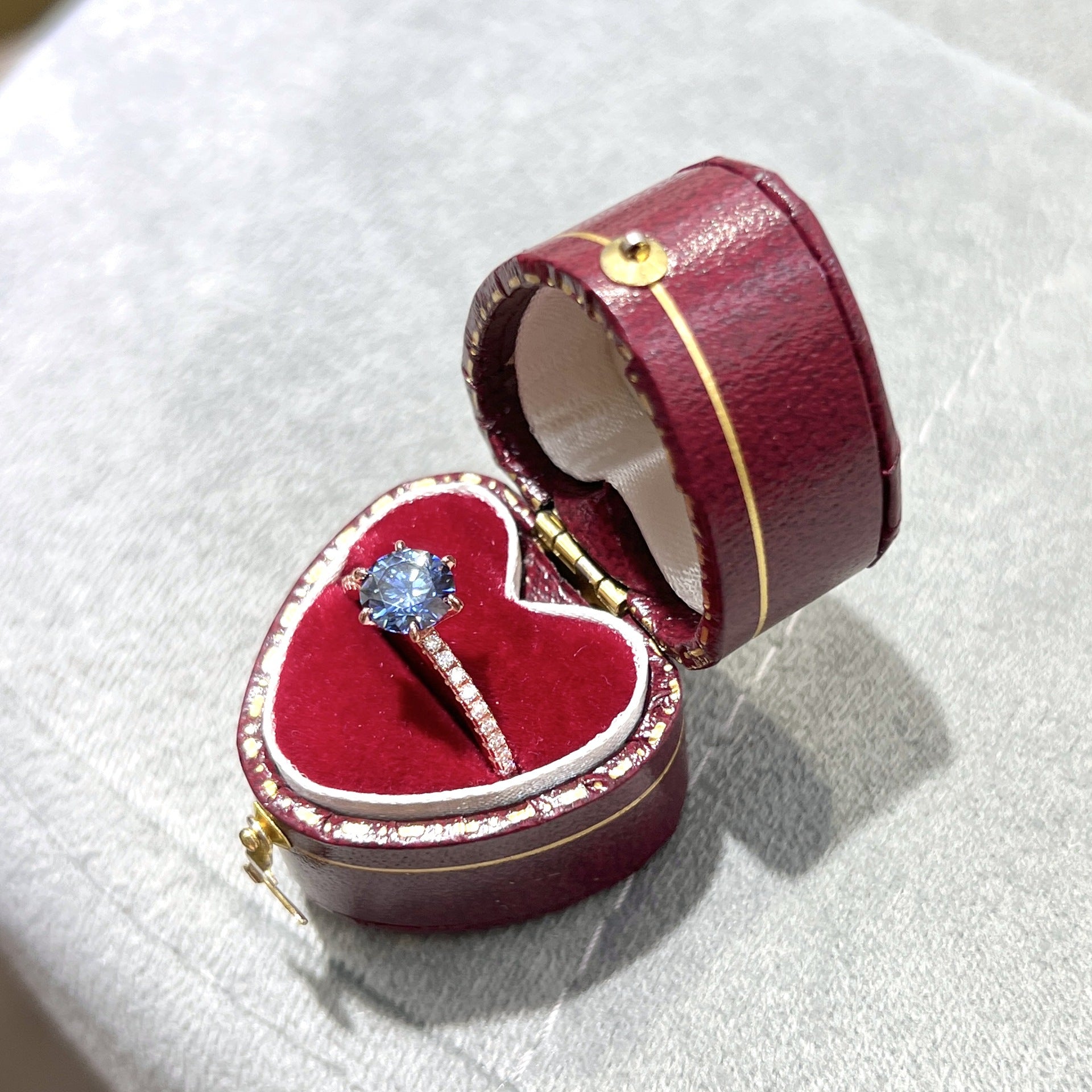 Glojewels Rose Gold Half Eternity 1ct Blue Moissanite Round Cut Silver Ring