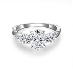 Glojewels Three Stone Twist 1.5ct White Moissanite Oval Cut Silver Ring