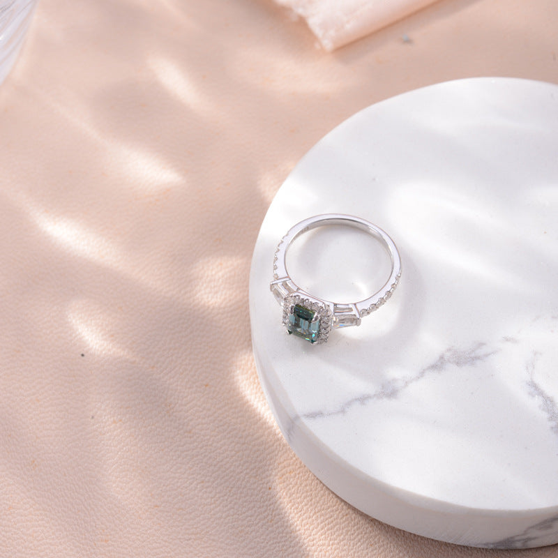 Glojewels Three Stone Halo 1ct Blue-green Moissanite Emerald Cut Silver Ring